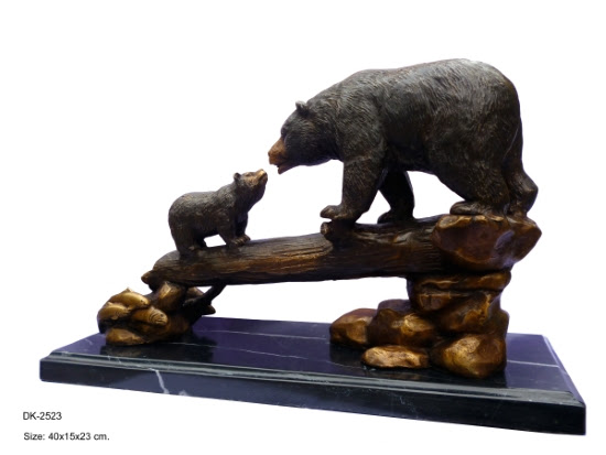 2 bronze bears on log - Click Image to Close